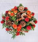 Holly Flower and Orange Roses in a Glass Aquarium