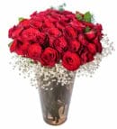 50 Red Roses in a Decorative Glass Vase