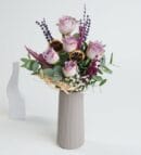 Lilac Roses in a Beige Vase