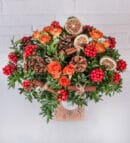 Holly Flower and Orange Roses in a Glass Aquarium