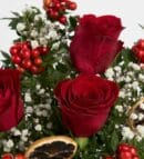 Holly Flower and Red Roses in Glass Vase