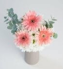 White Daisies & Pink Gerberas in a Beige Vase